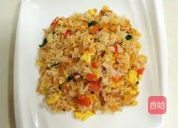 Illustration of how to make tomato and egg fried rice 9