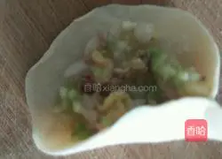 Dumplings...Illustration of how to make zucchini, egg and onion stuffing 15