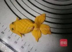 Illustration of how to make goldfish steamed buns 17