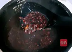 Illustration of how to make black rice porridge 8