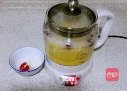 Illustration of how to make red dates, longan and millet porridge 4