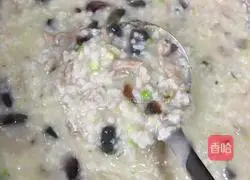 Illustration of how to make preserved egg and lean meat porridge 9