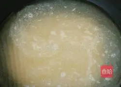 Illustration of how to make egg yolk millet porridge 4