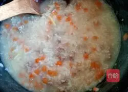 Illustration of how to make carrot and minced meat porridge 9
