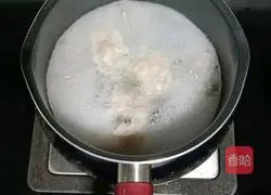 Illustration of how to make double rice lotus seed and pork ribs porridge (baby food supplement) 4