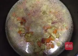 Illustration of how to make braised rice with sausage, carrots and potatoes 6