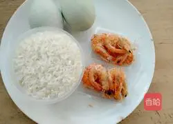 Illustration of how to make dried shrimps and eggs casserole porridge 1