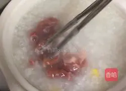 Illustration of how to make fresh squid and lean meat porridge 3