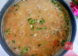 Illustration of how to make mushroom, carrot and chicken porridge 18