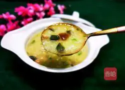 Illustration of how to make preserved egg and lean meat porridge 18