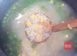 Illustration of how to make scallop pastoral casserole porridge 12