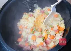 Illustration of how to make carrot and potato braised rice 13