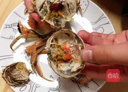 Illustration of how to make crab roe casserole porridge 14