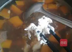 Illustration of how to make pumpkin and mung bean porridge 10