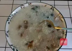 Illustration of how to make preserved egg and lean meat porridge 13