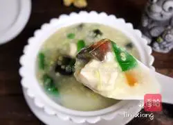 Illustration of how to make preserved egg chicken and millet porridge 14