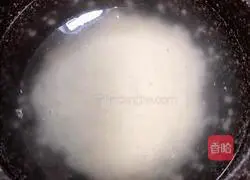 Illustration of how to make crab roe casserole porridge 8