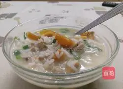 Illustration of how to make preserved egg and lean meat porridge 4