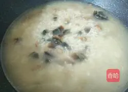 Illustration of how to make preserved egg and lean meat porridge 6