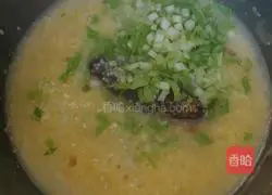 Illustration of how to make ginger, sea cucumber and millet porridge 9