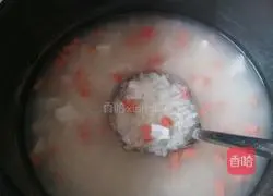 Illustration of how to make salted duck egg white, ham sausage and white rice porridge 7