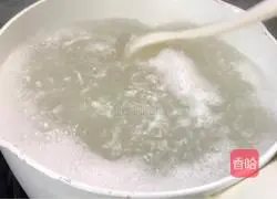 Illustration of how to make wolfberry and shrimp skin porridge 3