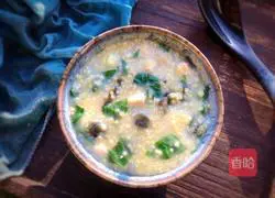 Illustration of how to make cabbage, frozen tofu and preserved egg porridge 12