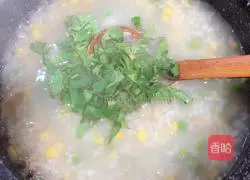 Illustration of how to make scallop pastoral casserole porridge 14