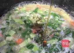 Illustration of how to make carrot and millet porridge 8