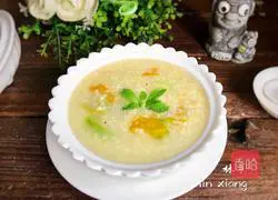 Illustration of how to make pumpkin flower rock sugar millet porridge 11