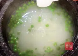 Illustration of how to make crab roe casserole porridge 12