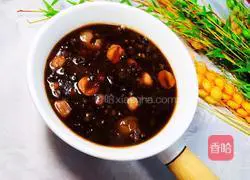 Illustration of how to make black rice eight-treasure porridge 14