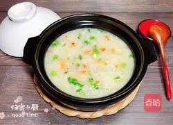 Illustration of how to make crab roe casserole porridge 19