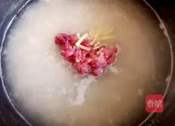 Illustration of how to make preserved egg and lean meat porridge 9