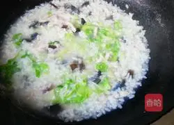 Illustration of how to make preserved egg and lean meat porridge 7