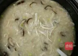 Illustration of how to make mushroom and shredded chicken porridge 8