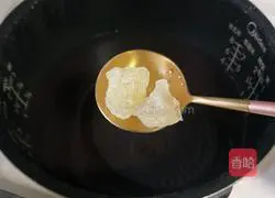 Illustration of how to make fragrant and glutinous purple rice porridge 7