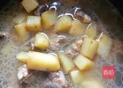 Illustration of how to make braised rice with potatoes and ribs 6