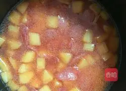 Illustration of how to make potato and sausage braised rice 5