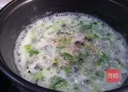 Illustration of how to make preserved egg and vegetable porridge 10