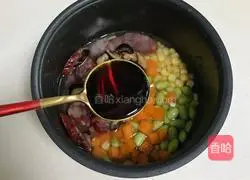 Illustration of how to make braised sausage and vegetables with rice 5