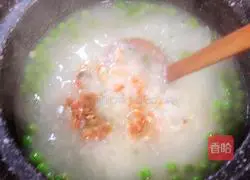 Illustration of how to make crab roe casserole porridge 16