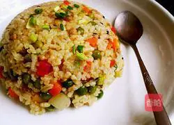 Illustration of how to make braised rice with colorful vegetables 14
